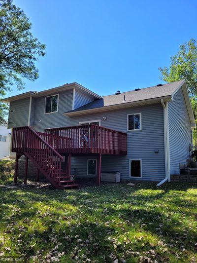 20240923_142634.jpg Back view of home with spacious deck and staircase making access to the rear yard easy!! | Image 3