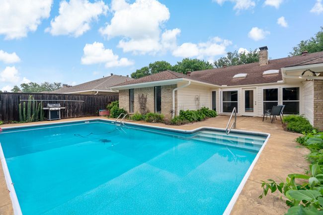 View of pool featuring fence, a fenced in pool, area for grilling, and a patio area | Image 28