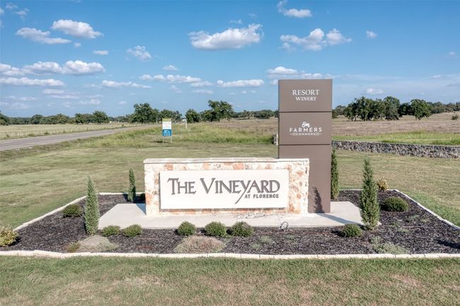 Community sign with a rural view and a yard | Image 25