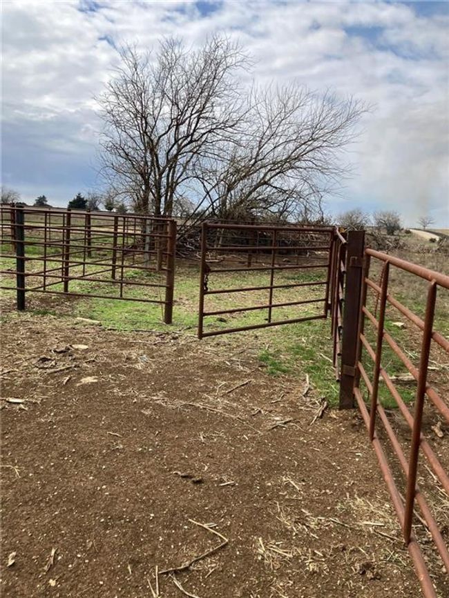 View of gate with fence and a rural view | Image 6