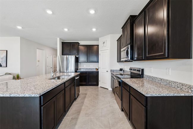 9804 Rowing Dale Bnd, House other with 4 bedrooms, 3 bathrooms and null parking in WESLEY CHAPEL FL | Image 12