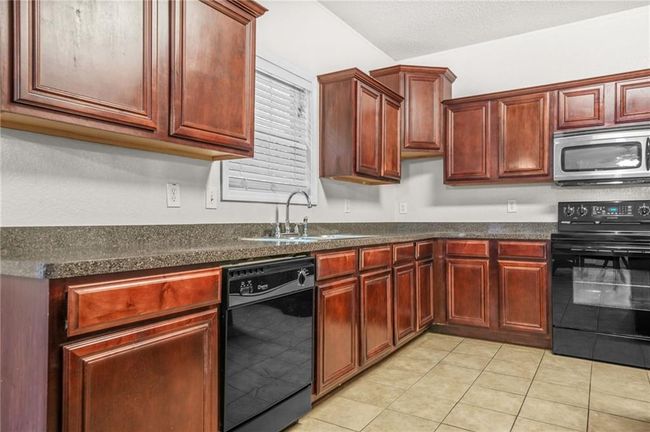 3492 Newtons Crest Cir, House other with 4 bedrooms, 3 bathrooms and null parking in Snellville GA | Image 12