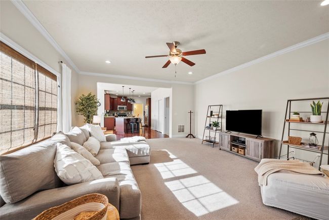 The family room opens to the kitchen for ease of communication between the 2 rooms. | Image 16