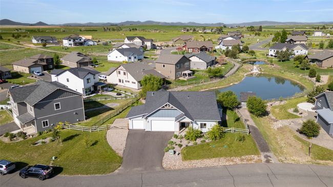 Aerial view of residential area with a water and mountain view | Image 39