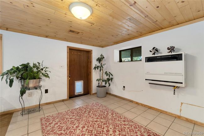 Finished Basement with dog door and dog run. | Image 22