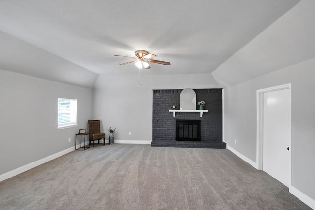 HUGE living room with brand new carpet and woodburning fireplace | Image 8