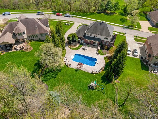 Private fenced in yard with heated inground salt water pool. | Image 39