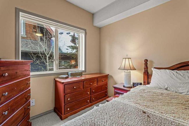 307 - 176 Kananaskis Way, Condo with 2 bedrooms, 1 bathrooms and 2 parking in Canmore AB | Image 5