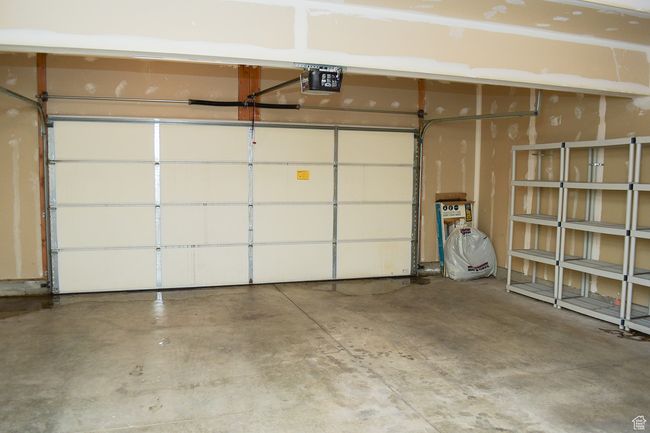 Garage featuring a garage door opener | Image 15