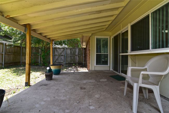 Fenced backyard featuring a patio | Image 29