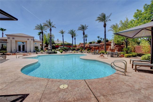 Pool with fence, a patio, and french doors | Image 51