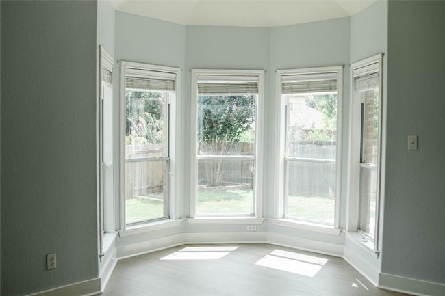 View of unfurnished sunroom | Image 14