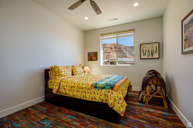 2nd Bedroom featuring, baseboards, ceiling fan, wood finished floors, shades and recessed lighting | Image 26