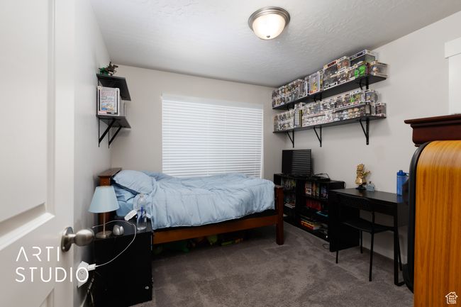 View of carpeted bedroom | Image 19