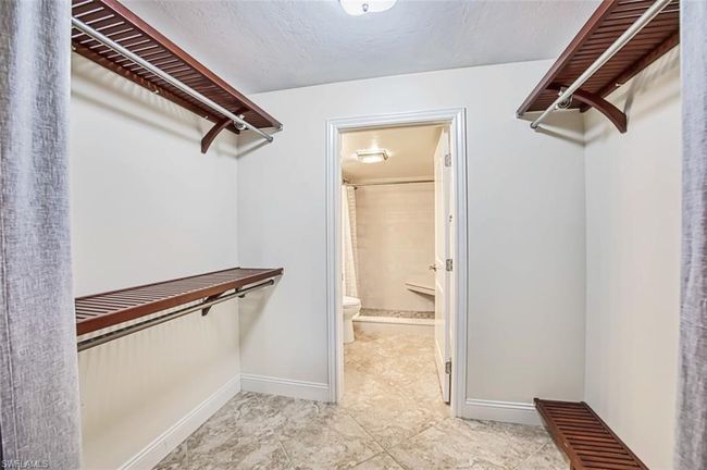 Walk in closet with tile patterned flooring | Image 29
