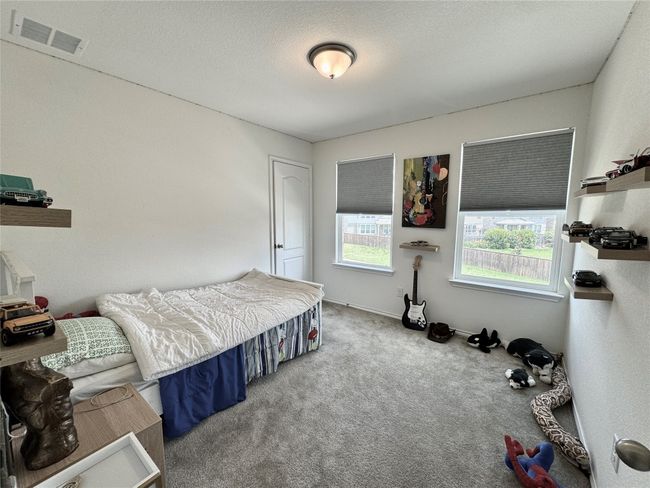 View of carpeted bedroom | Image 27