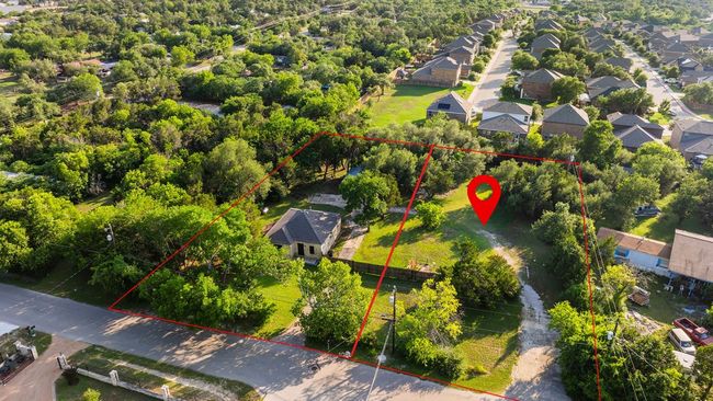 Aerial perspective of suburban area with property parcel outlined | Image 6