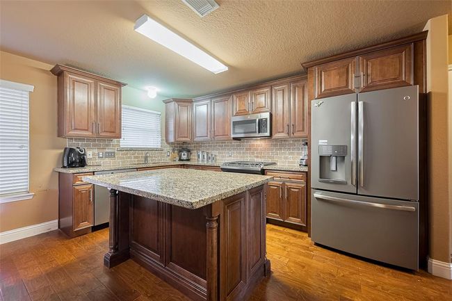 1402 Merryglen Ct, House other with 3 bedrooms, 3 bathrooms and 2 parking in Spring TX | Image 10