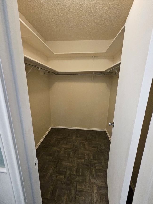 View of walk in closet | Image 24