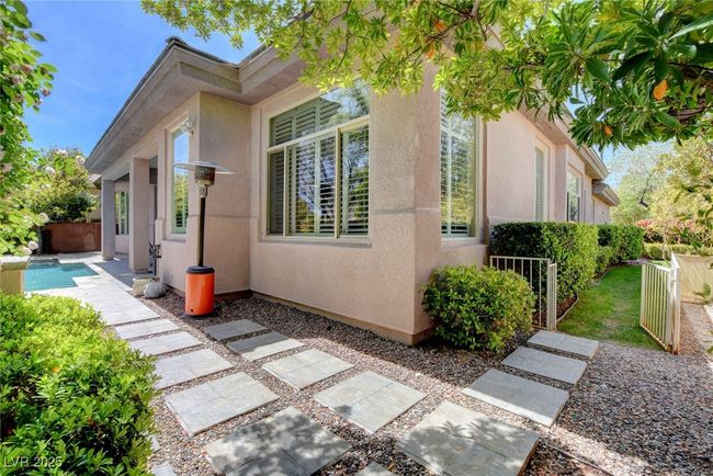 View of side of home featuring fence and stucco siding | Image 49