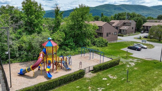 View of jungle gym and a mountain view | Image 29