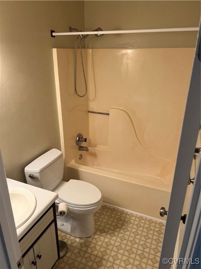 Bathroom with vanity and shower / tub combination | Image 13