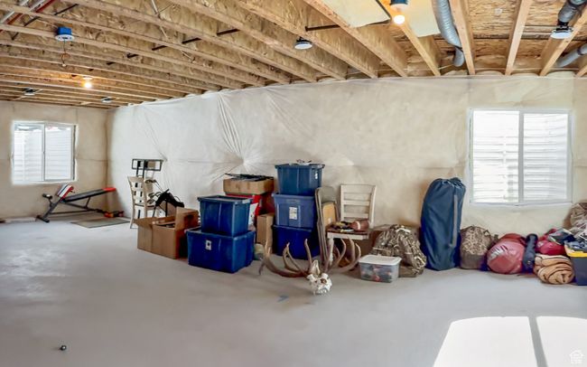 Basement featuring plenty of natural light | Image 29