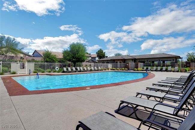 Community pool featuring a patio area | Image 73