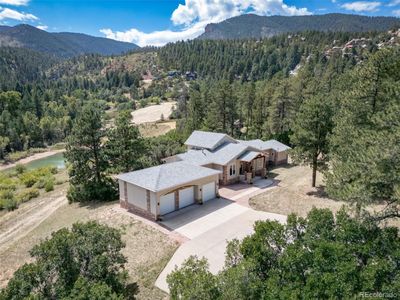 7255 Perry Park Boulevard, House other with 3 bedrooms, 2 bathrooms and 3 parking in Larkspur CO | Image 2