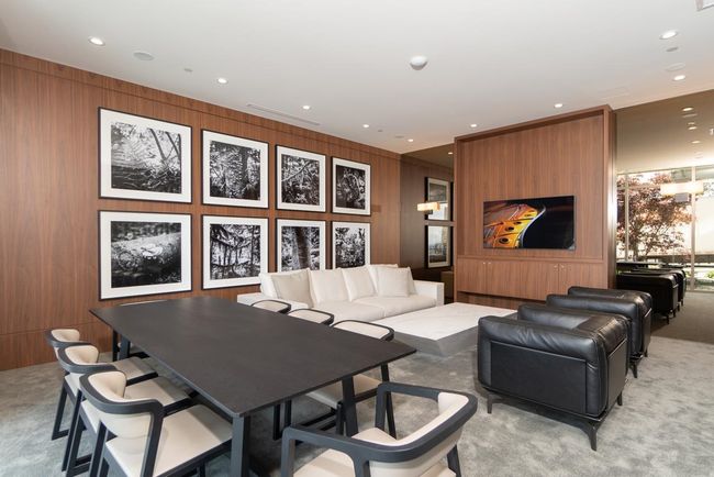Living room featuring light colored carpet and recessed lighting | Image 6