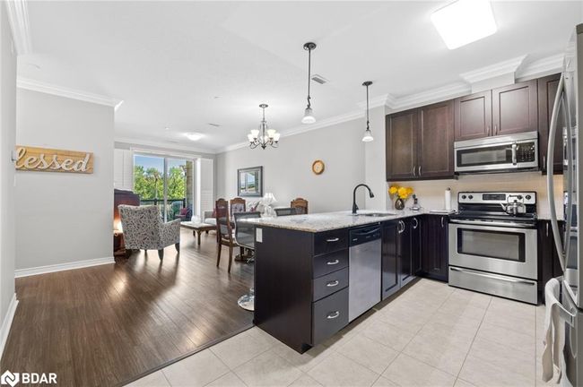 112 - 33 Whitmer St, House attached with 2 bedrooms, 2 bathrooms and 1 parking in Milton ON | Image 4