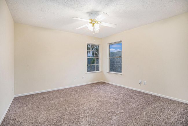 One of 3 bedrooms located on second floor. | Image 31