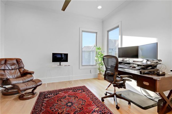 Office area with recessed lighting, wood finished floors, baseboards, and ornamental molding | Image 30