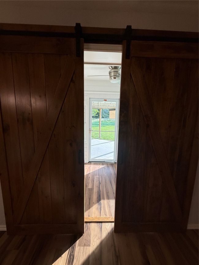 sun room / office with barn doors | Image 16