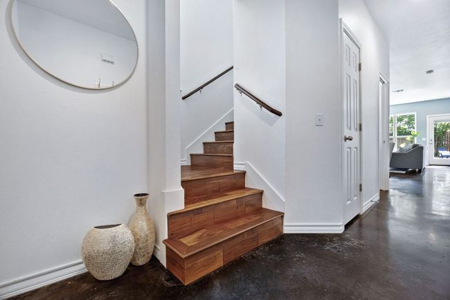 First floor features polished concrete and the stairs/upstairs feature luxury vinyl plank. | Image 17