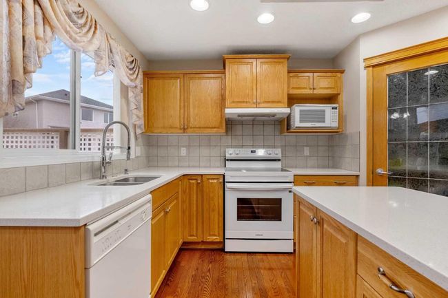 226 Everwillow Close Sw, House other with 5 bedrooms, 4 bathrooms and 4 parking in Calgary AB | Image 7