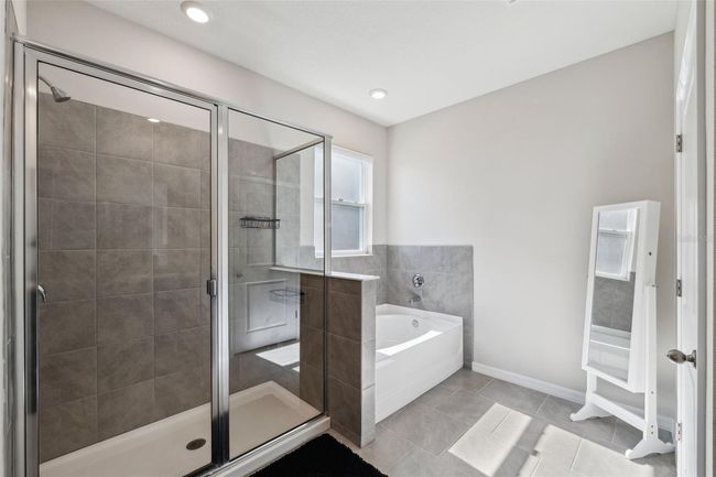 9804 Rowing Dale Bnd, House other with 4 bedrooms, 3 bathrooms and null parking in WESLEY CHAPEL FL | Image 37