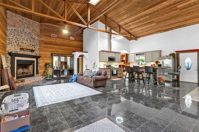 Cedar walls and ceiling in the great room | Image 9