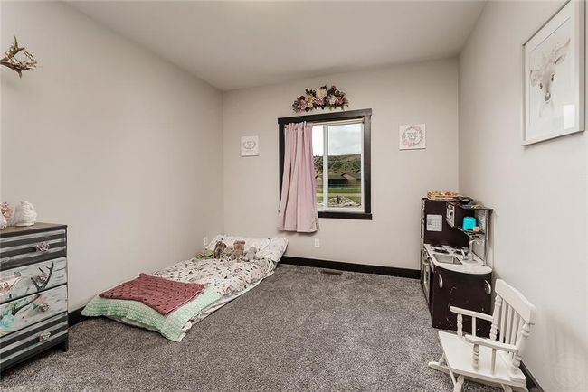 Bedroom 4/office or Den with 9 ft ceiling. | Image 10