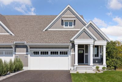 This opulent Twinhome by Charles Cudd Company seamlessly marries architectural and interior design with a functional layout for enduring appeal. | Image 1