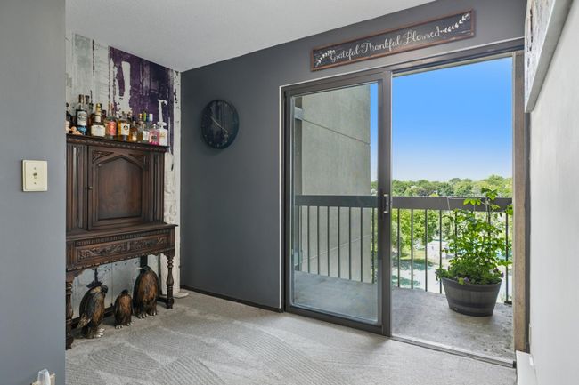 Den or office area overlooking the balcony | Image 7