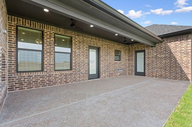 View of patio featuring ceiling fan | Image 36