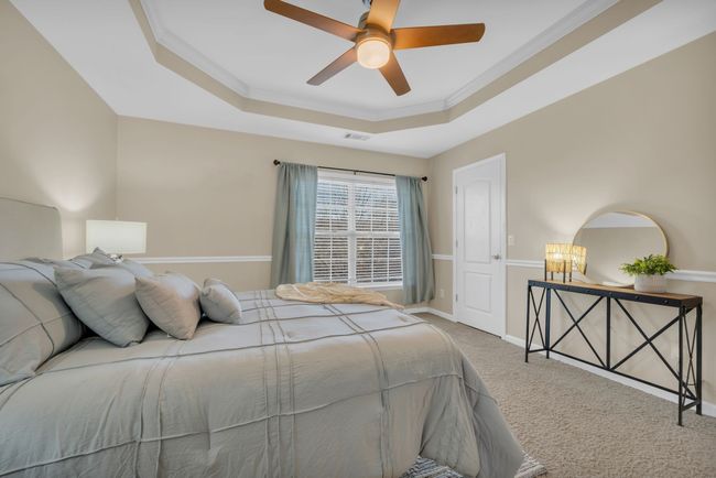 GUEST Bedroom w/ Upgraded Carpet, Trey Ceiling + Walk In Closets | Image 29