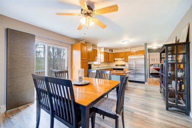 Dining space featuring sliders to back deck | Image 9