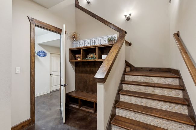Stairs featuring concrete floors | Image 28