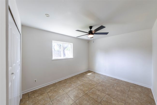 Bedroom No. 2 - all bedrooms offer ceiling fans and new closet doors. | Image 21