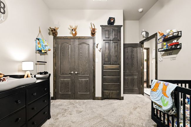 Bedroom with carpet flooring | Image 26
