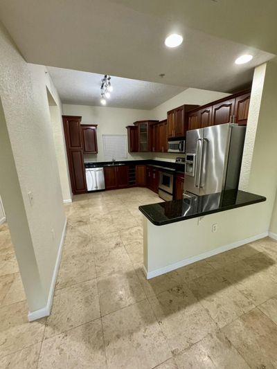 103 - 1640 Presidential Way, Condo with 2 bedrooms, 2 bathrooms and null parking in West Palm Beach FL | Image 2