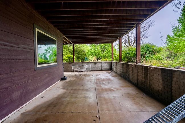 View of patio featuring outdoor dining area | Image 36