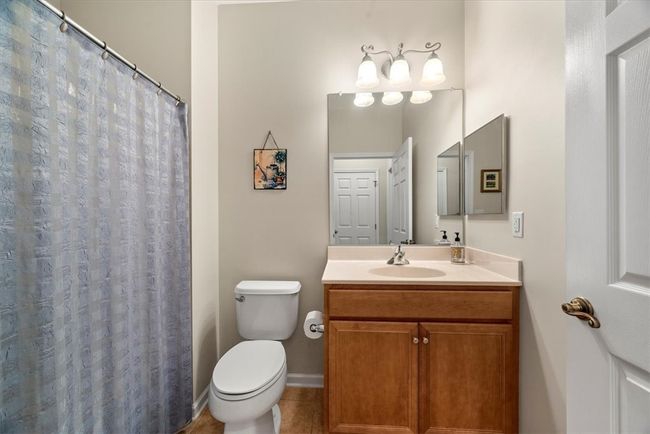 Guests can use this 2nd full bathroom on the main level that sits right next to the guest bedroom on the main level. | Image 22